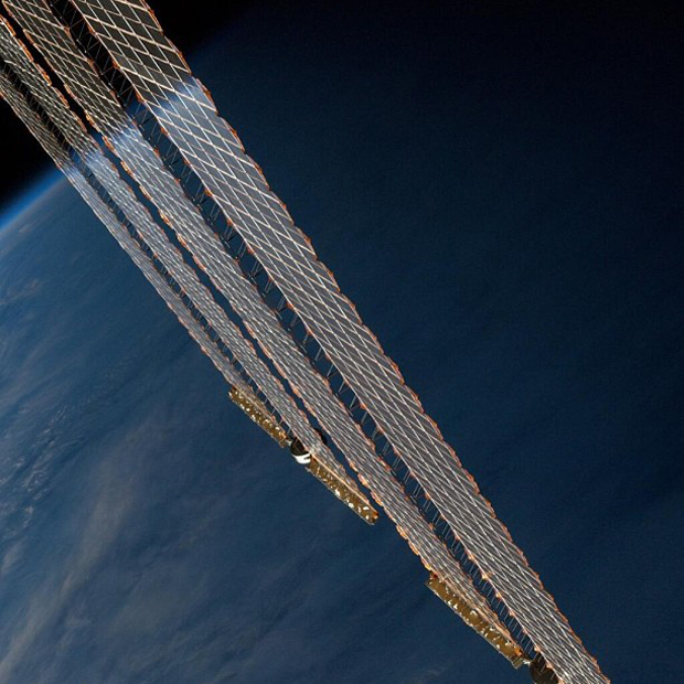 Earth's Beauty Reflects Off Space Station Solar Wings In Striking Astronaut Photo